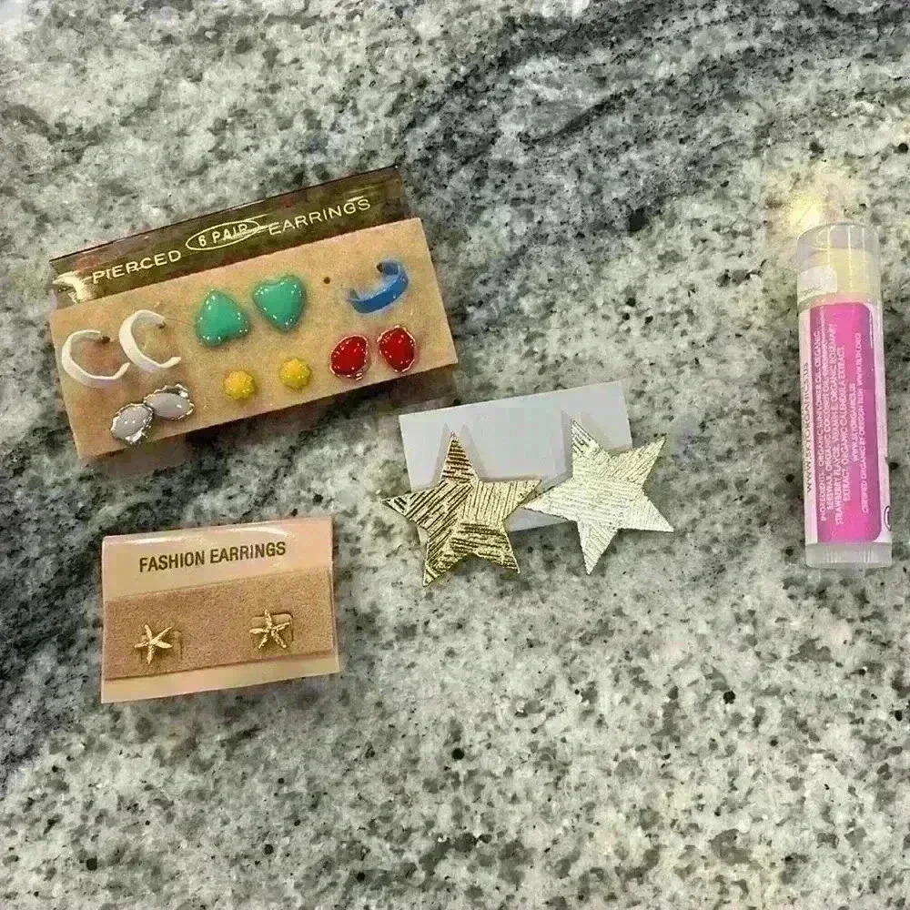 Vintage bundle of 7 pairs of costume jewelry with hoops heart, stars, & starfish